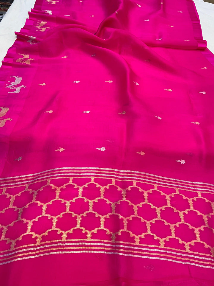 Pure Kora silk handloom Banarasi saree draped with Kadhwa Sona Rupa butis, Mashru silk border featuring hiran motifs, and elegant designer pallu