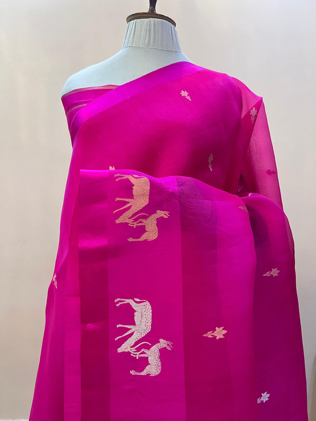 Pure Kora silk handloom Banarasi saree draped with Kadhwa Sona Rupa butis, Mashru silk border featuring hiran motifs, and elegant designer pallu