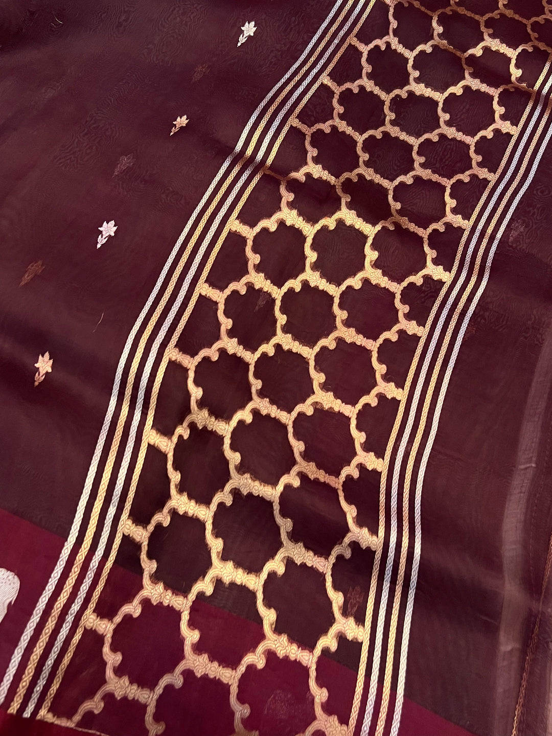 Classy designer pallu woven with shimmering golden zari on pure handloom Kora silk Banarasi saree