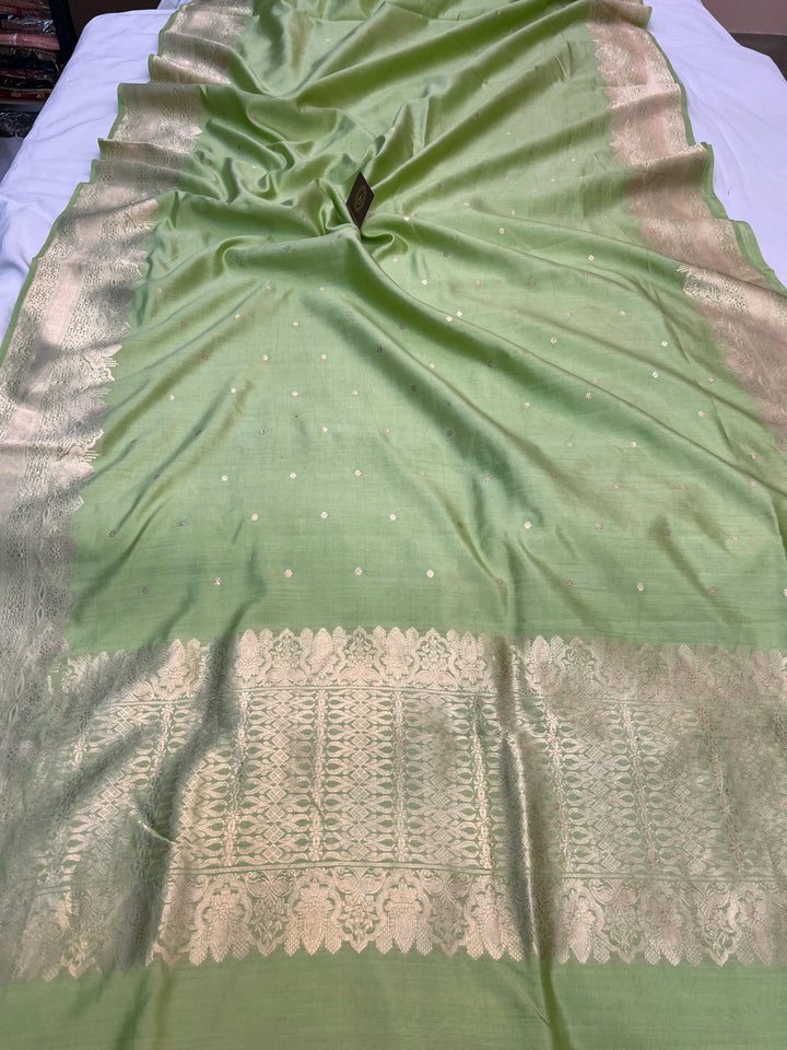 Full view of Pista Green Pure Chiniya Silk Handloom Banarasi Saree with golden zari kadhwa butis