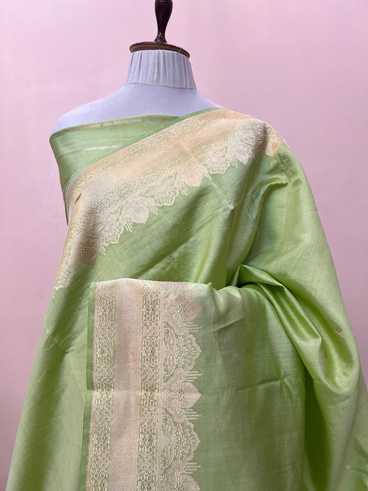 Draped pic of Pista Green Pure Chiniya Silk Handloom Banarasi Saree with golden zari kadhwa butis