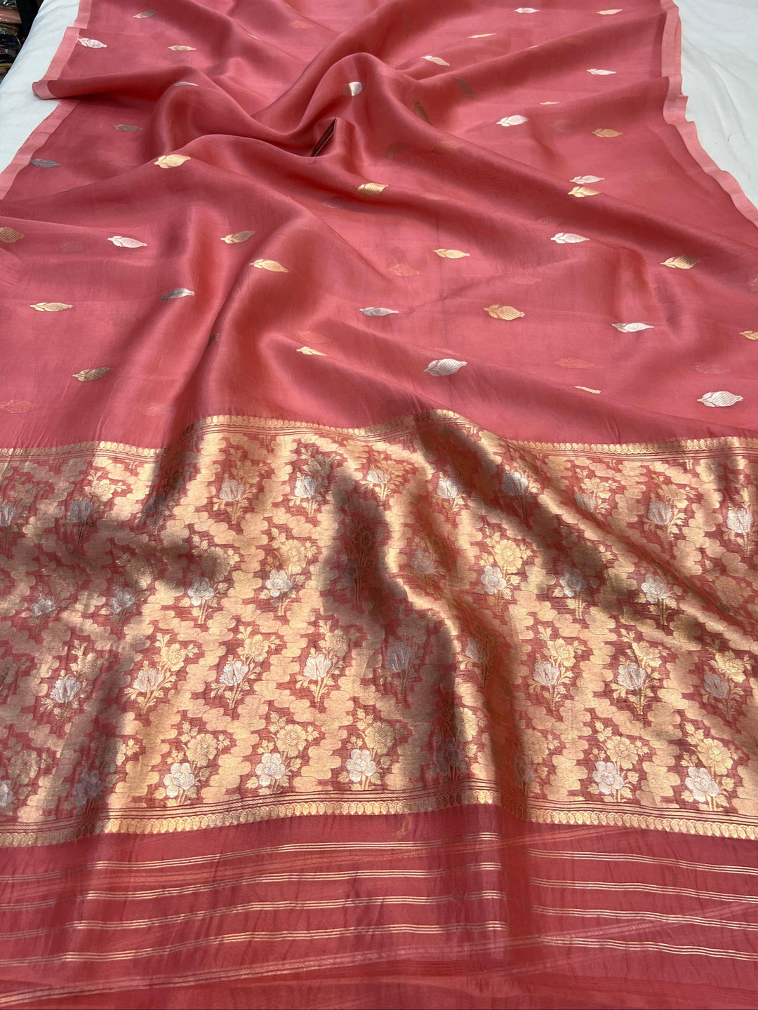 Pure Kora silk handloom Banarasi saree draped with Kadhwa Sona Rupa butis, sleek Mashru silk border, and elegant designer pallu