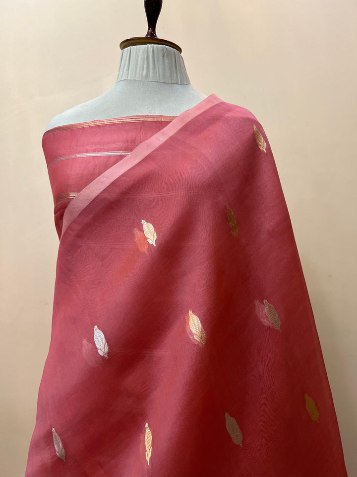 Pure Kora silk handloom Banarasi saree draped with Kadhwa Sona Rupa butis, sleek Mashru silk border, and elegant designer pallu