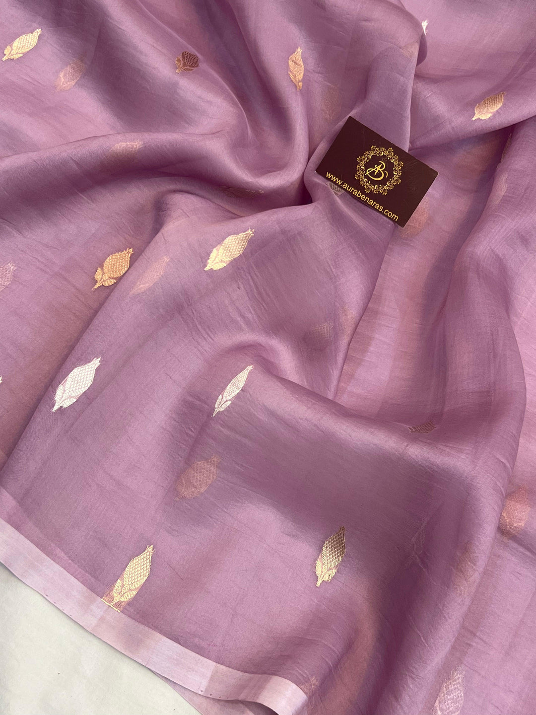 Kadhwa Sona Rupa butis in gold and silver zari, handwoven on lightweight Kora silk Banarasi saree