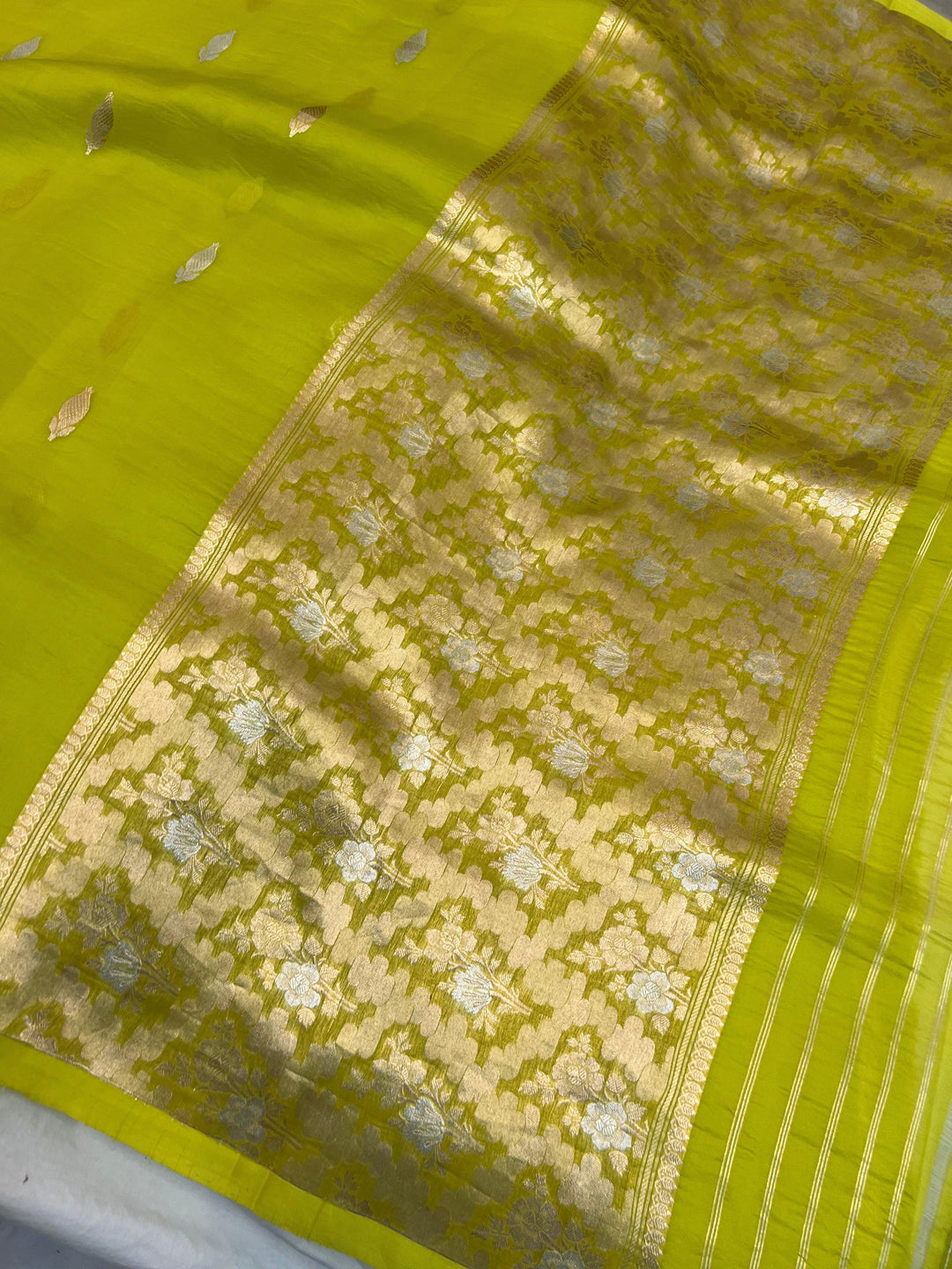 Classy designer pallu woven with gold and silver zari on pure Kora silk Banarasi saree