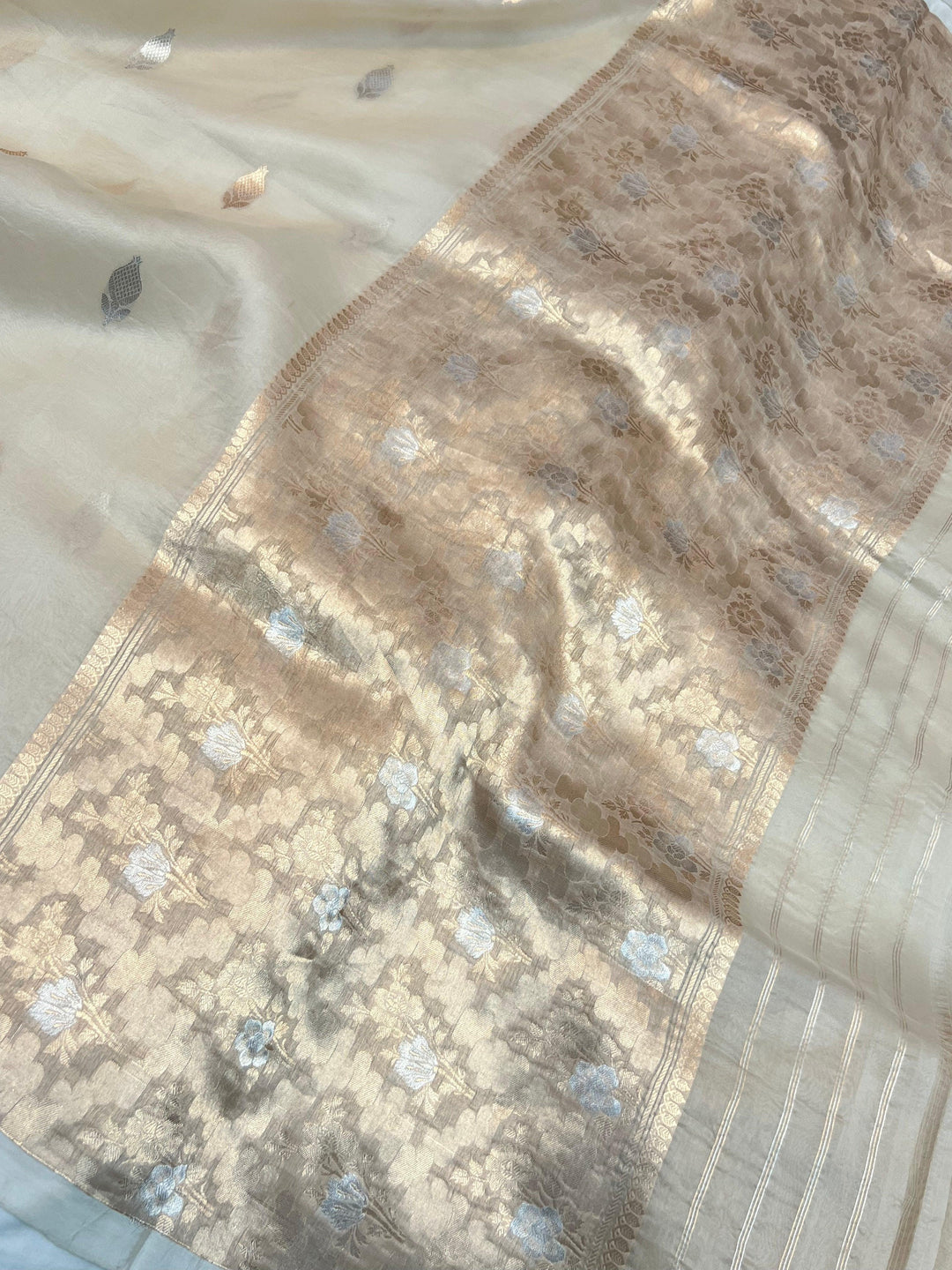 Classy designer pallu woven with gold and silver zari on pure Kora silk Banarasi saree