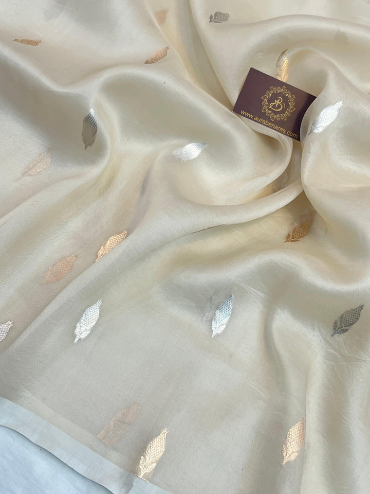 Kadhwa Sona Rupa butis in gold and silver zari, handwoven on lightweight Kora silk Banarasi saree