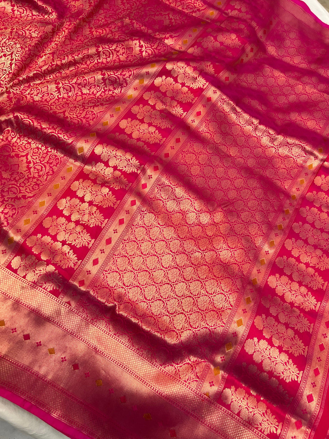 Rich pallu of pure Katan silk handloom Banarasi saree highlighting the golden zari geometric design