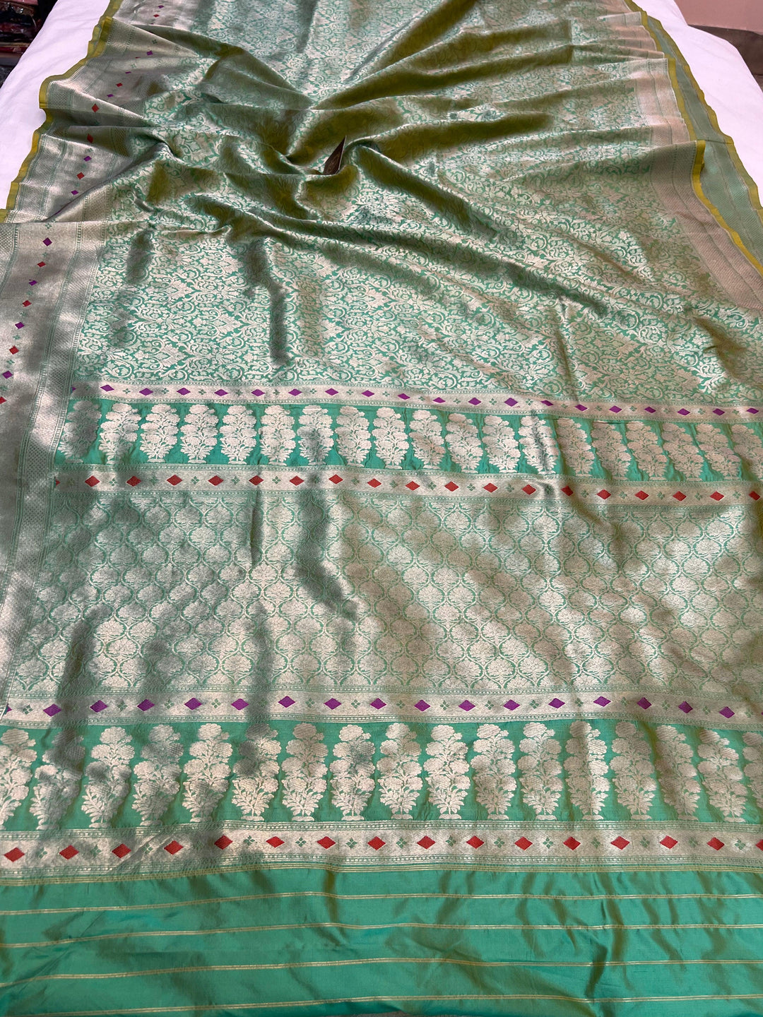 Pure Katan silk handloom Banarasi saree with golden geometric brocade and Meenakari designer border