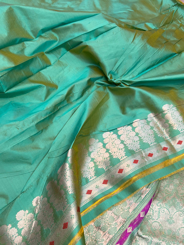 Plain blouse piece with matching border included with pure Katan silk Banarasi saree