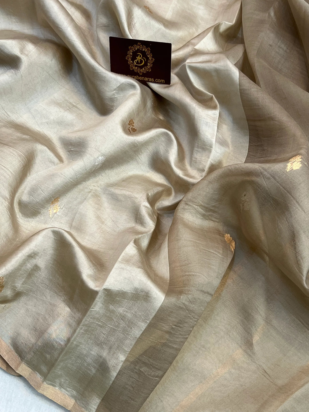 Close-up of Kadhwa sona rupa butis on triple weave Banarasi saree