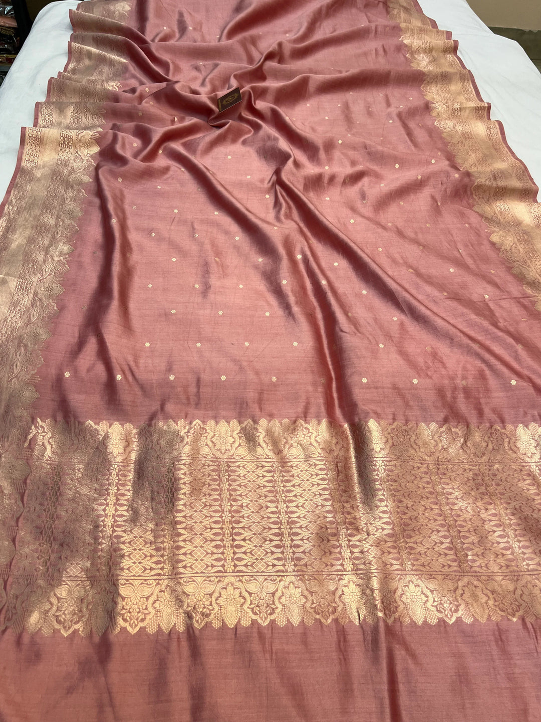 Full view of Pastel pink Pure Chiniya Silk Handloom Banarasi Saree with golden zari kadhwa butis
