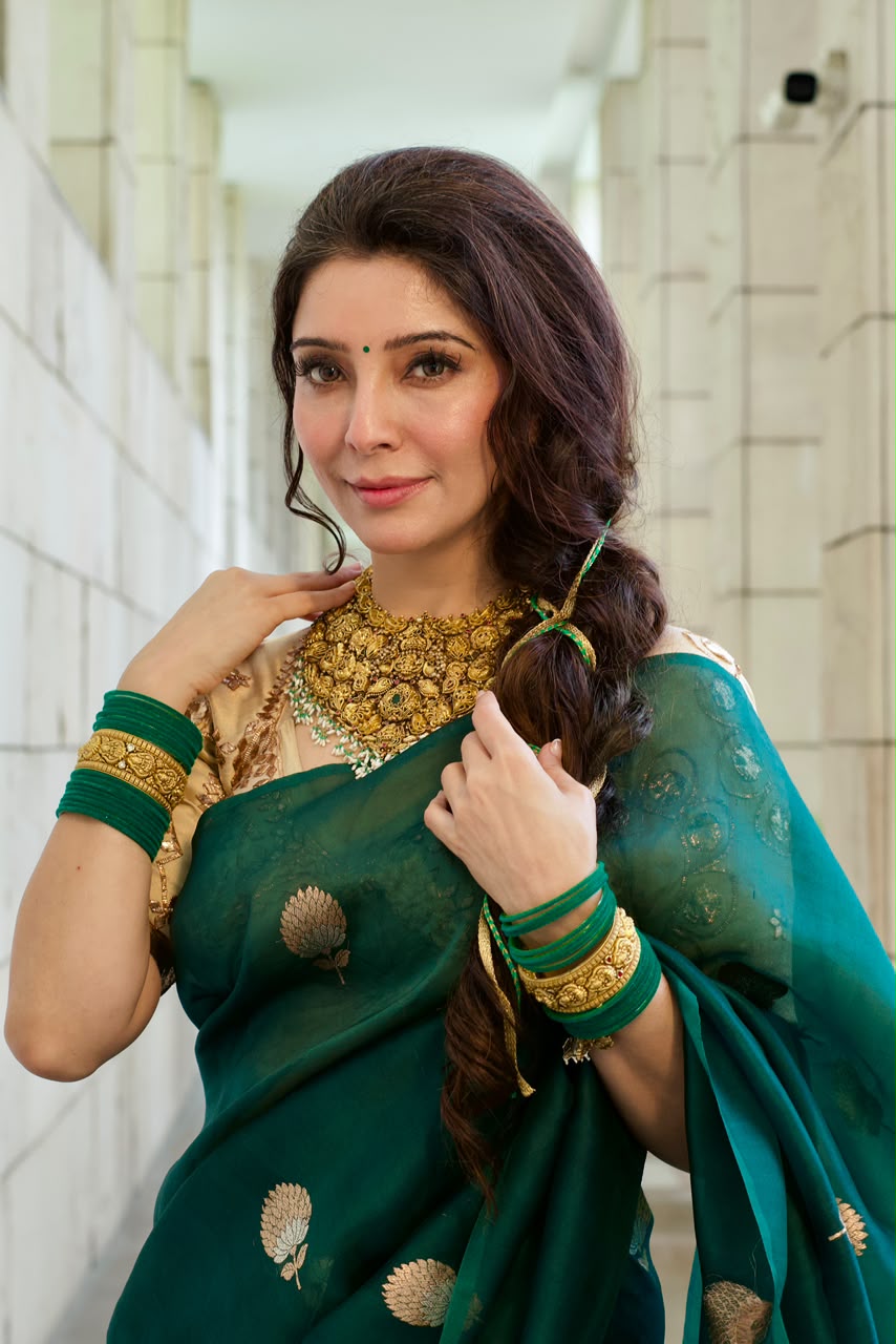 Dr Jai Madaan in a Bottle Green Kora Silk Banarasi Saree with Sona Rupa Butis