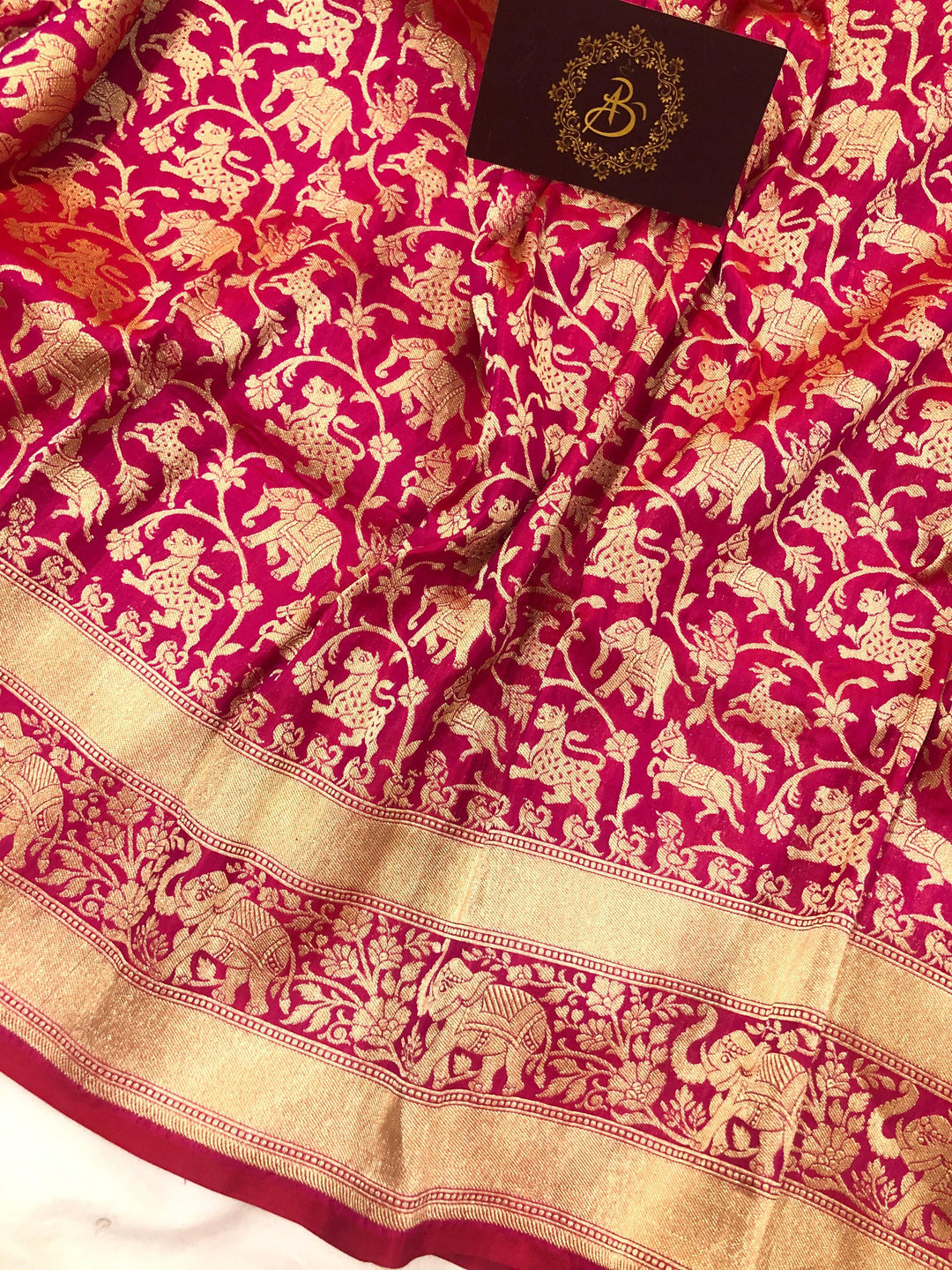 Cutwork weave detail on Katan silk fabric with traditional Shikargaah pattern