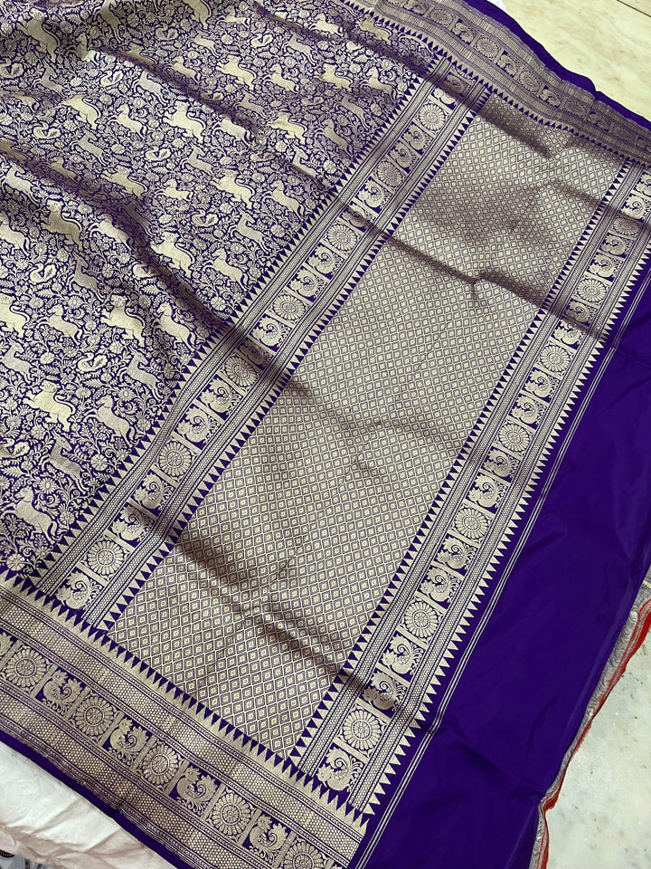 Shikargaah motif pallu with fine cutwork weaving on a Banarasi handloom saree