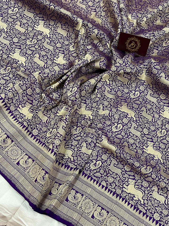 Cutwork weave detail on Katan silk fabric with traditional Shikargaah pattern