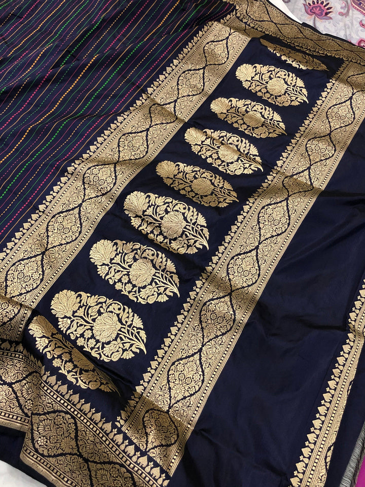 Detailed pallu of Banarasi handloom saree showcasing Kadhwa zari weaving on pure Katan silk