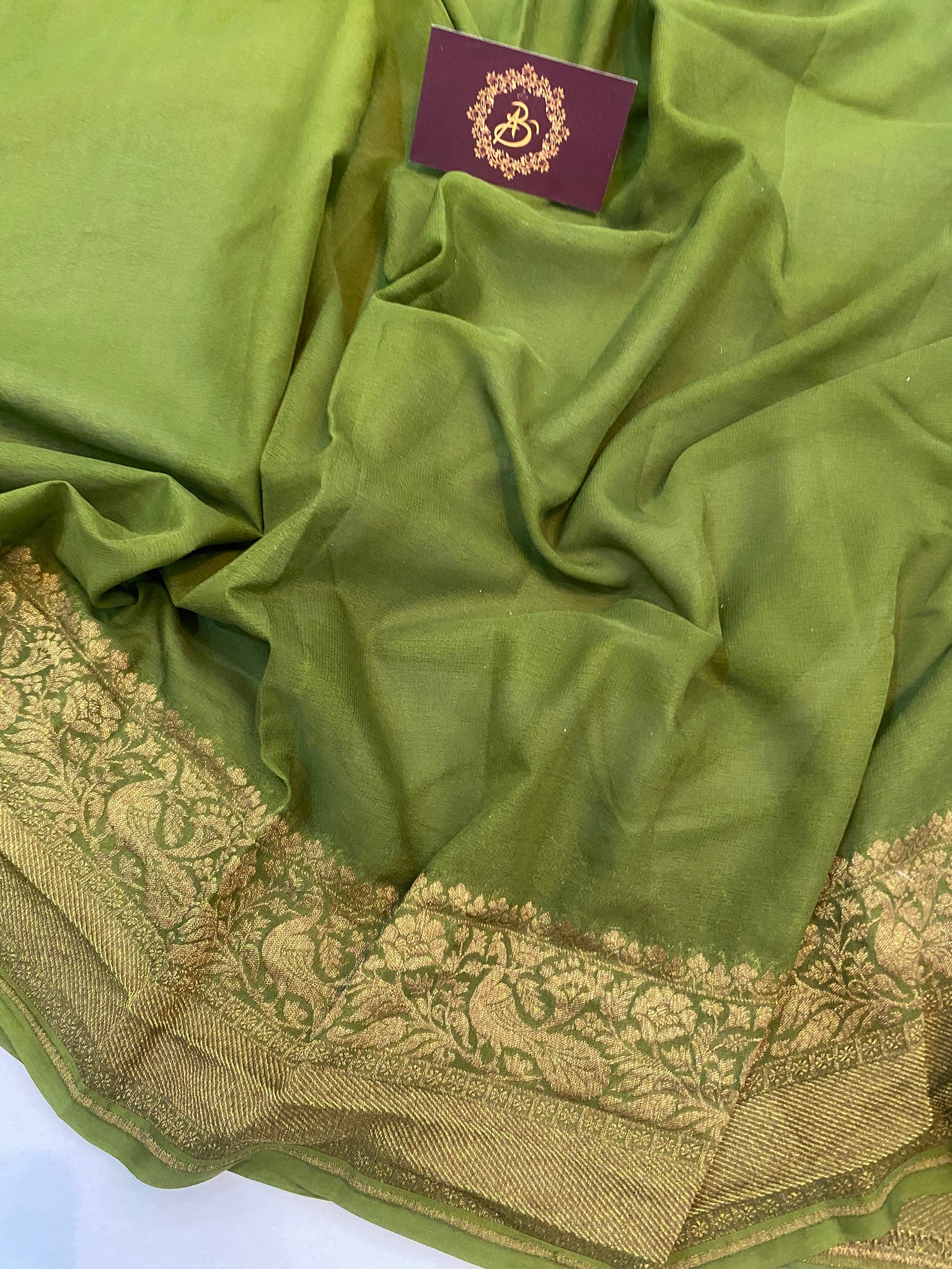 Mehendi green crepe silk resham and mirror embellished saree