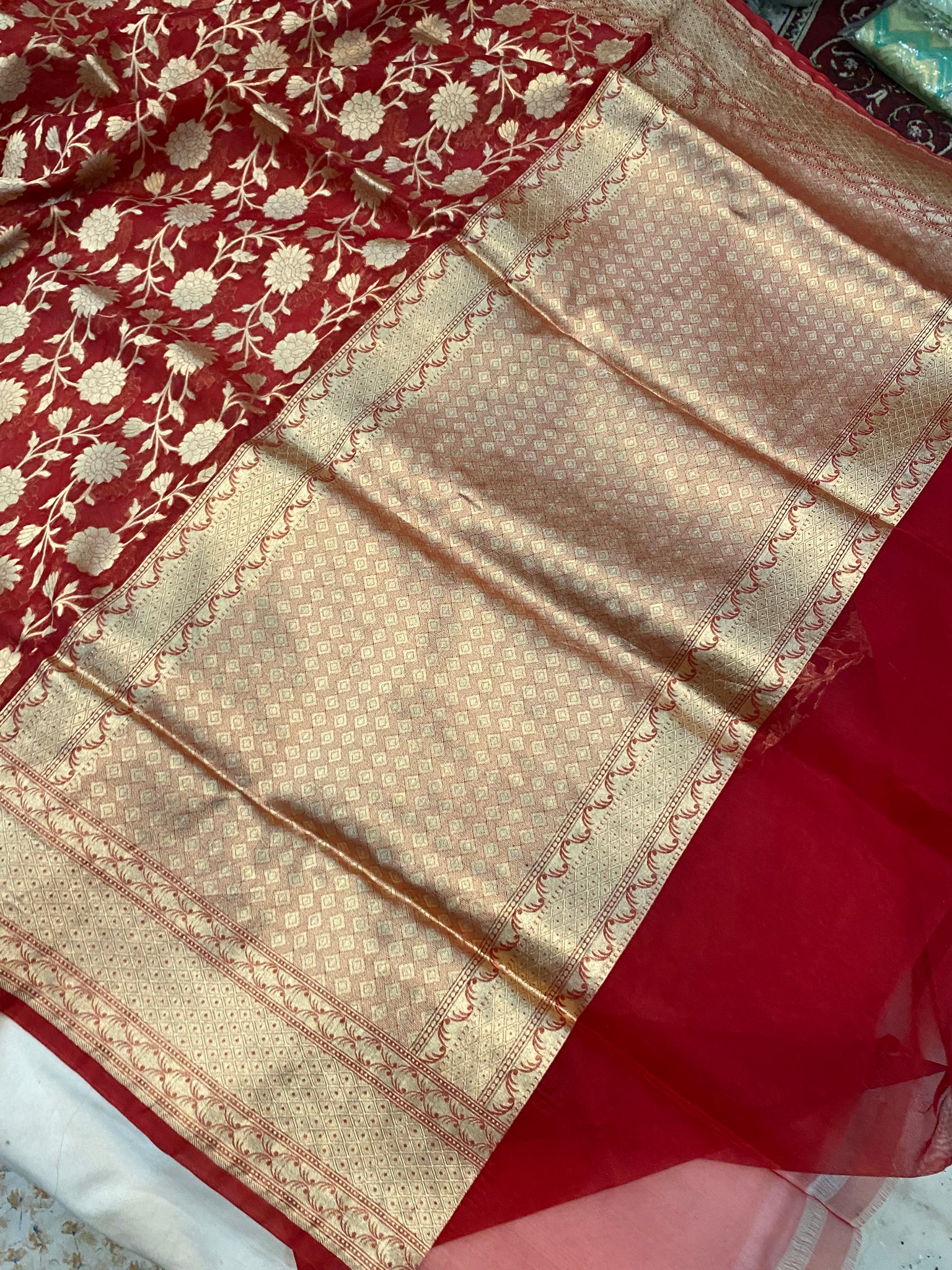 Rani Pink Floral Woven Banarasi Silk Saree With Tassels